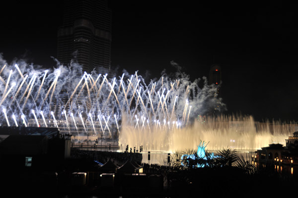 Fireworks at the base of the Burj Khalifa behind the Dubai Fountain