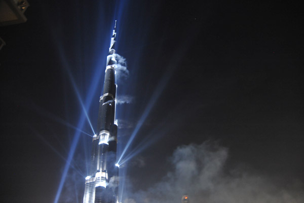 A bright beam illuminates the pinnacle of Burj Khalifa, 2723 feet (830m) tall