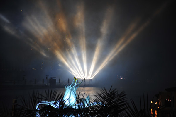 Lotus flower sculpture in the pond with spotlights 