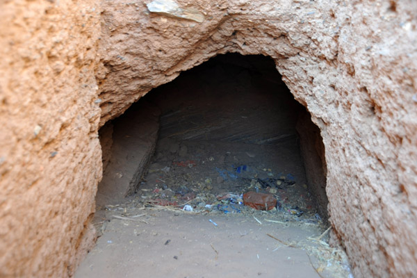 Like most ancient passages I explored in Sudan, this one led to a small trash-filled chamber