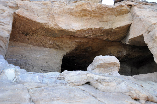 An ancient cave carved into the cliff