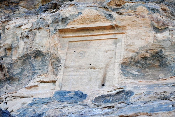 Hieroglyphic tablet near the cave