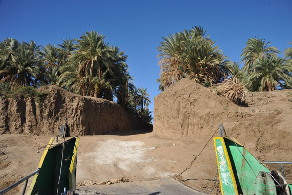 Road cut into the embankment at the New Delgo Ferry landing on the west bank of the Nile