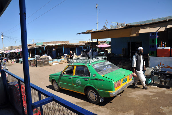 A formerly yellow taxi painted green, Selem