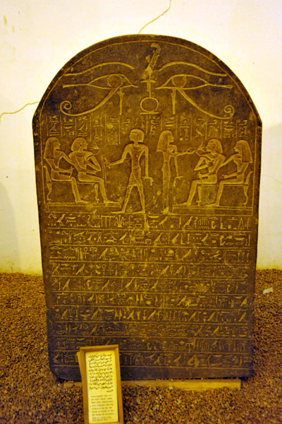 Black granite stela carved with hieroglyphics