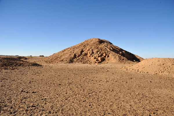 The poorly preserved remains largest pyramid at El Kurru