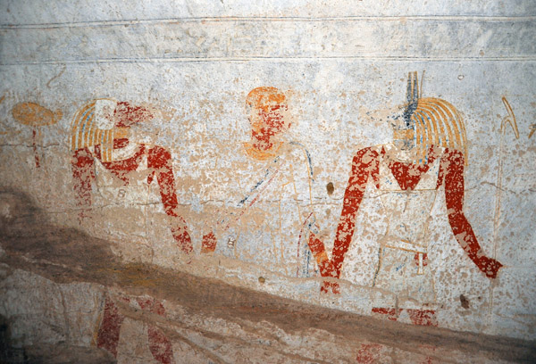 Queen Qalhata being led by two gods, Hapy and Duamutef, sons of Horus