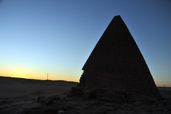 Silhouette of one of the pyramids at dusk