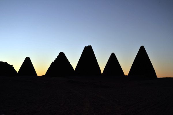 The pyramids at Karima appear like a row of sharp teeth