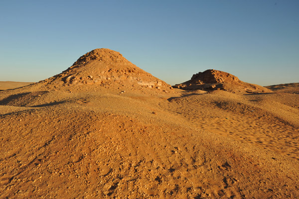 Two of the pyramids of the northern group that have been reduced to mere mounds