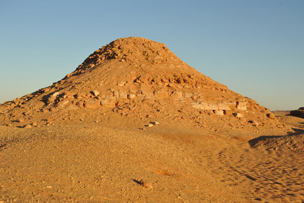 Remains at the Royal Cemetery of a barely-recognizable pyramid