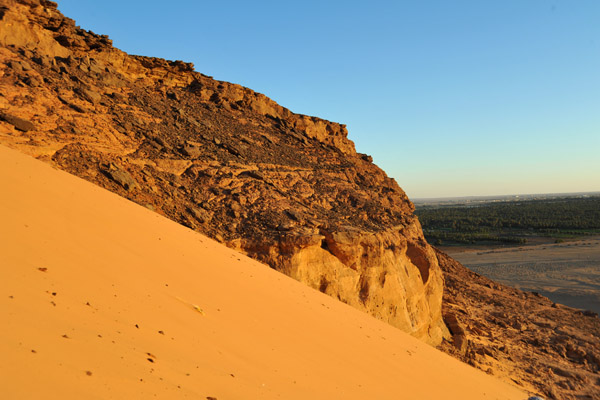 Descending the western face of Jebel Barkal via the sand dune