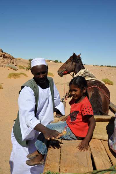 Riding a horse cart around Jebel Barkal