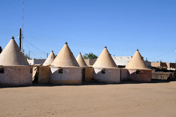 Brick huts with conical roofs that apparently used to belong to the Sudan Railways