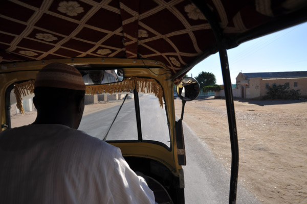 Riding a tuk-tuk back to the guesthouse