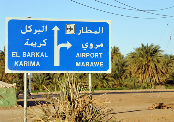 Road sign for the Merowe Airport across the new bridge