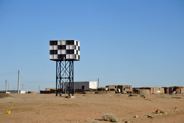 Checkered water tower typical of Northern Sudan