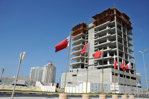 Bahraini flags lining a road, Najmah Island