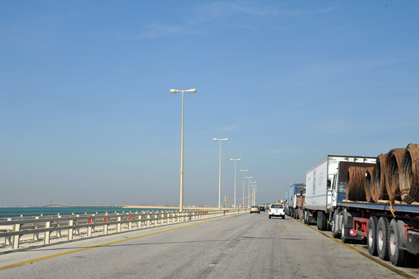 Trucks backed up for miles along the King Fahd Causeway approaching the border checkpoint