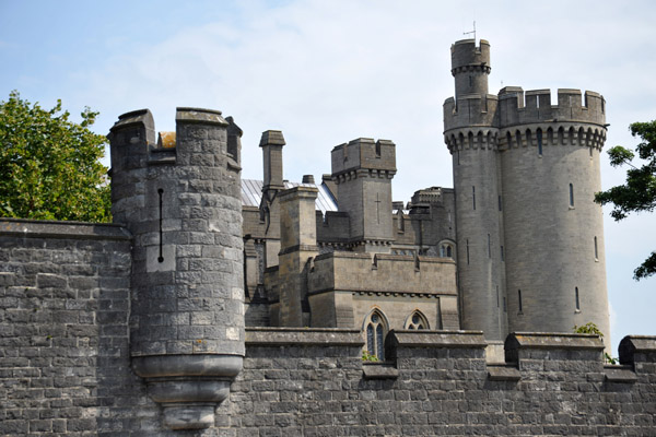 Towers of Arundel Castle from over the wall at the Lower Lodge