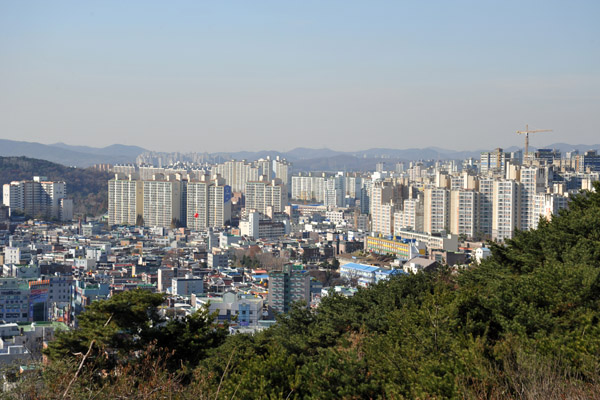 View of the modern city of Suwon from the western wall of Hwaseong Fortress