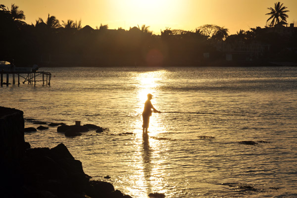 Fisherman at sunset, Grand Baie