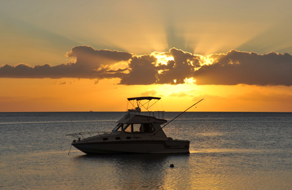 Mauritius sunset with a fishing boat, Balaclava