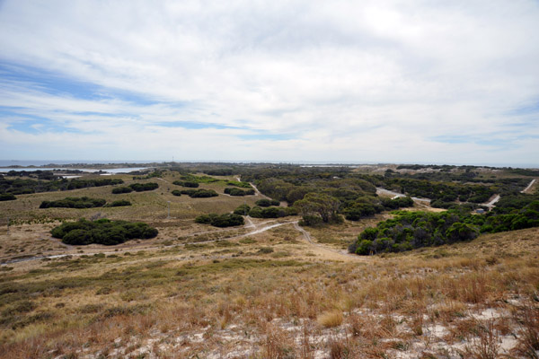 View to the east from the Wadjemup Lighthouse with the skyline of Perth dimly visible on the horizon
