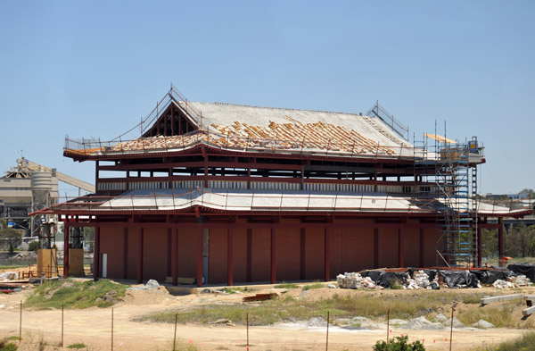 Chinese temple under construction outside Melbourne along the train tracks