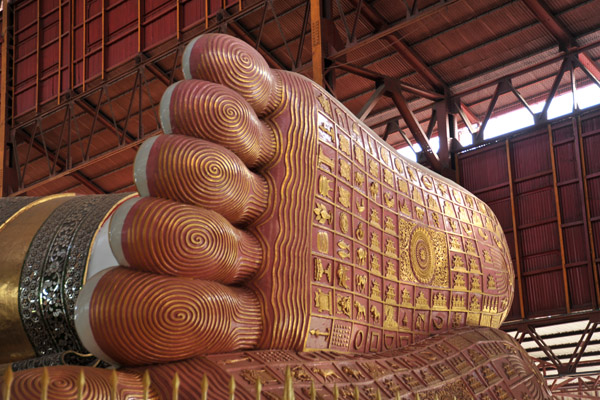 Massive foot of the Reclining Buddha of Chaukhtatgyi Paya covered with 108 sacred symbols