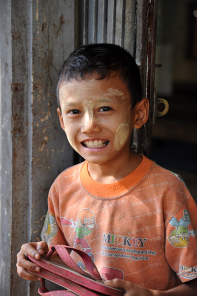 Young boy with Thanaka face paint, typical Burmese