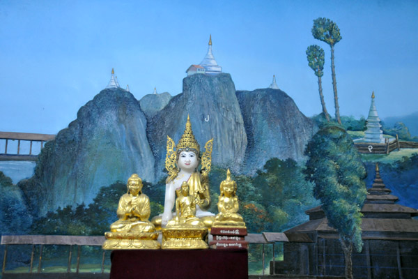 Buddha images in front of a stunning landscape, Maha Wizaya Paya