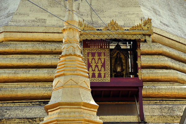 The small cable car is used to send offerings up into the main stupa of Sule Paya