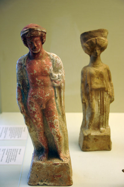 Terracotta figure of a youth holding a puppy ca 400 BC