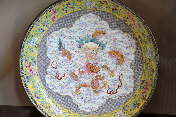 Copper plate decorated in painted enamels with a dragon, Qianlong Period, ca 1736-1795