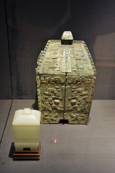 Bronze ritual vessel (Shang dynasty, 12th C. BC) and covered jade vessel (Qing dynasty, 18th C.)