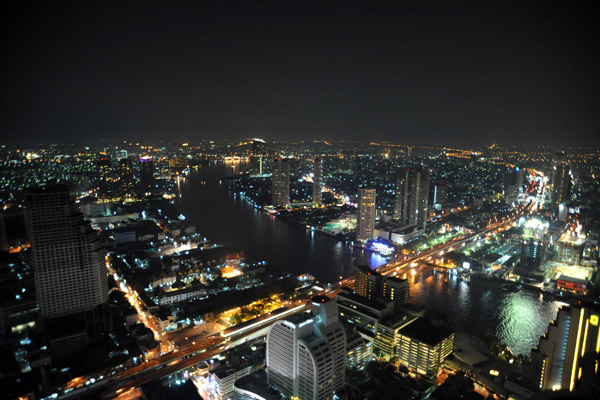 View SW from State Tower towards Taksin Bridge, Central Pier and Shangri-la Hotel