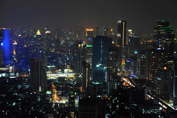 Towers of Silom Road from State Tower at night