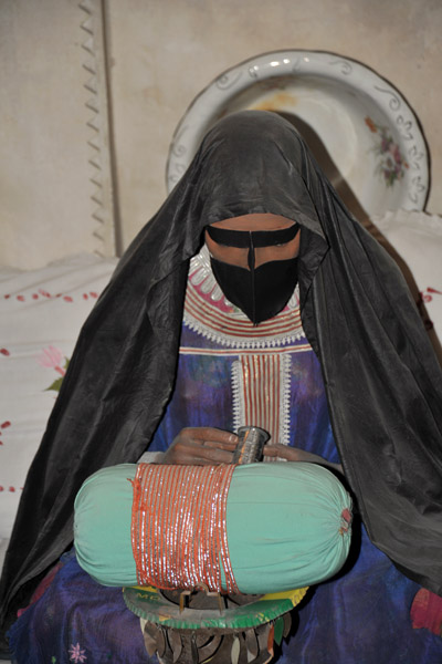 Woman embroidering, Dubai Museum