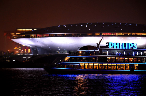 Philips boat cruising past the Expo Cultural Center