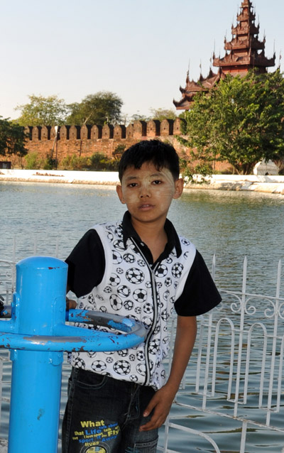 Burmese boy by the Mandalay Palace moat