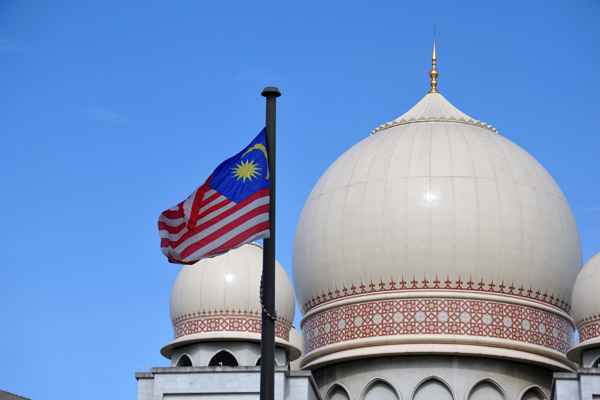 Dome of the Palace of Justice with the Malaysian flag, Putrajaya