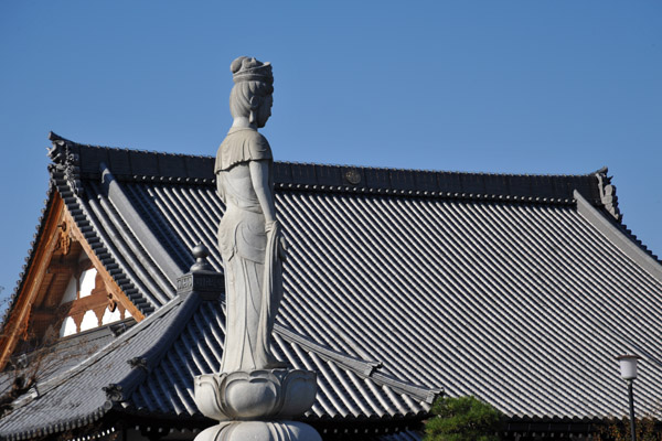 A statue with a tradition Japanese tile roof, Hikone