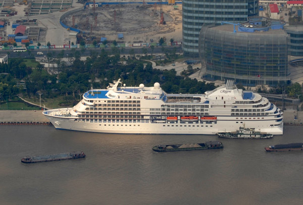 Regent Cruises Seven Seas Navigator docked on the Huangpu River, Shanghai