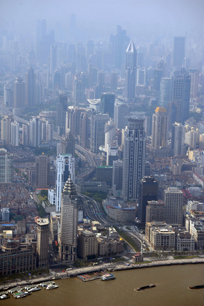 A tunnel crosses under the Huangpu River to emerge as Yan'an East Road