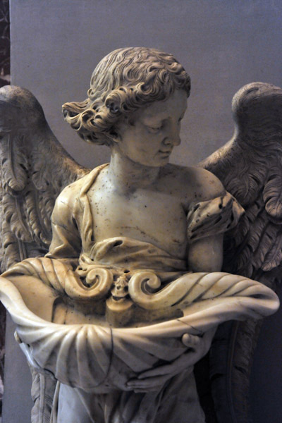 Angel holding a holy water font in the shape of a shell attributed to Giambattista Rossi, a student of Bernini