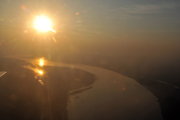 Sunset over the Irrawaddy River taking off from Bagan Airport