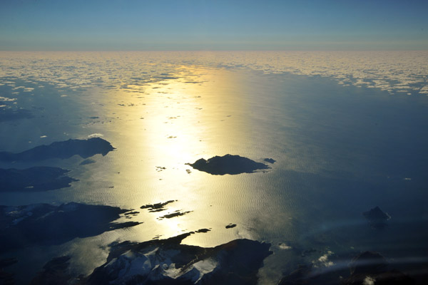 Island in the sun off southwest Greenland (