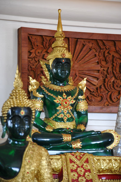 Repicas of the Emerald Buddha in green glass
