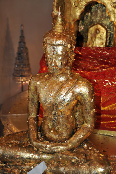 Buddha image covered in gold leaf, Wat Saket